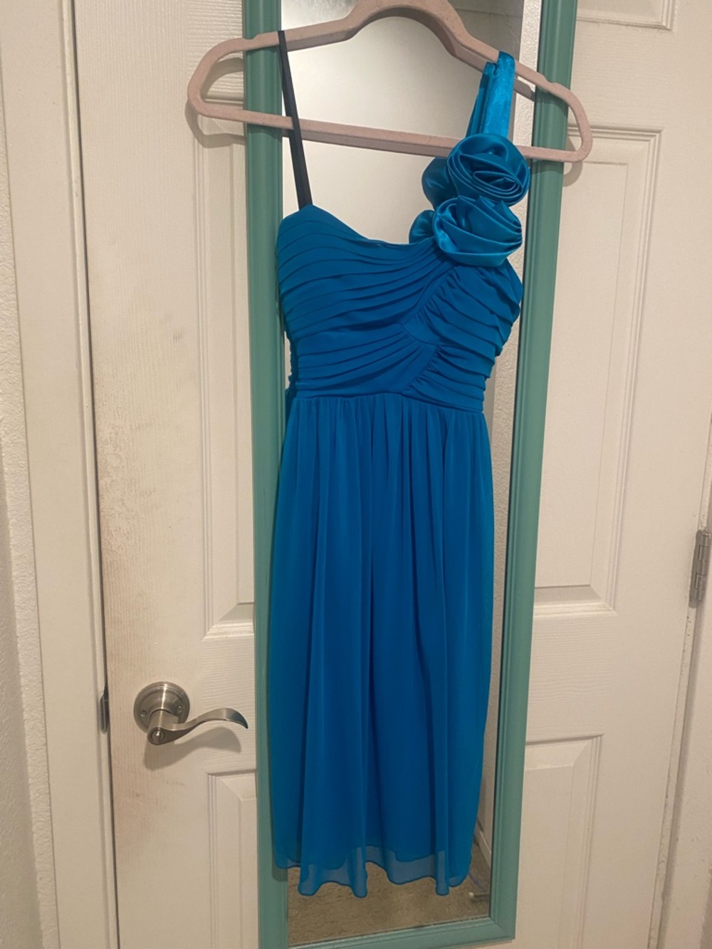 Blue one shoulder dress with flower